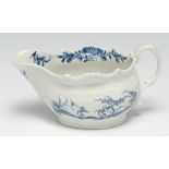 A Worcester Two Porter Landscape pattern creamboat, painted in blue, 15cm wide, crescent mark, c.