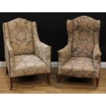 An associated pair of early 20th century drawing room chairs, stuffed-over studded border
