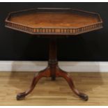 A 19th century mahogany octagonal tripod silver table, tilting top with baluster gallery, birdcage