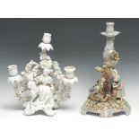 A German Rococo Revival Blanc de Chine three-branch figural candelabrum, Diana and Cupid, before a