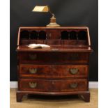 An 18th century Italian rosewood and marquetry serpentine fronted bureau, fall front enclosing a