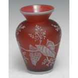 A Thomas Webb cameo glass vase, overlaid in white with leaves and foliage on ruby ground, 11.5cm