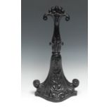 A Victorian cast iron door stop, by Baldwin of Stourport-on-Severn, cast with scrolling acanthus,