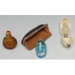 A Victorian Mary Gregory type bleu glass oval scent bottle, 5cm long, contemporary suede purse