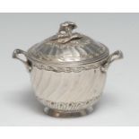 A 19th century French silver two handled porringer and cover, spirally fluted, the slightly domed