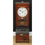 An early 20th century oak clocking-in machine, 23cm enamel dial inscribed National Time Recorder