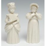 A Royal Worcester candlesnuffer, of Town Girl with a fan, 13.5cm high, crown and circle mark,