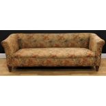 A Victorian country house Chesterfield sofa, stuffed-over upholstery, turned legs, 64cm high,