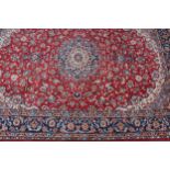 A Persian or Iranian woollen carpet, worked in the traditional manner, Najafabad, 449cm x 317cm