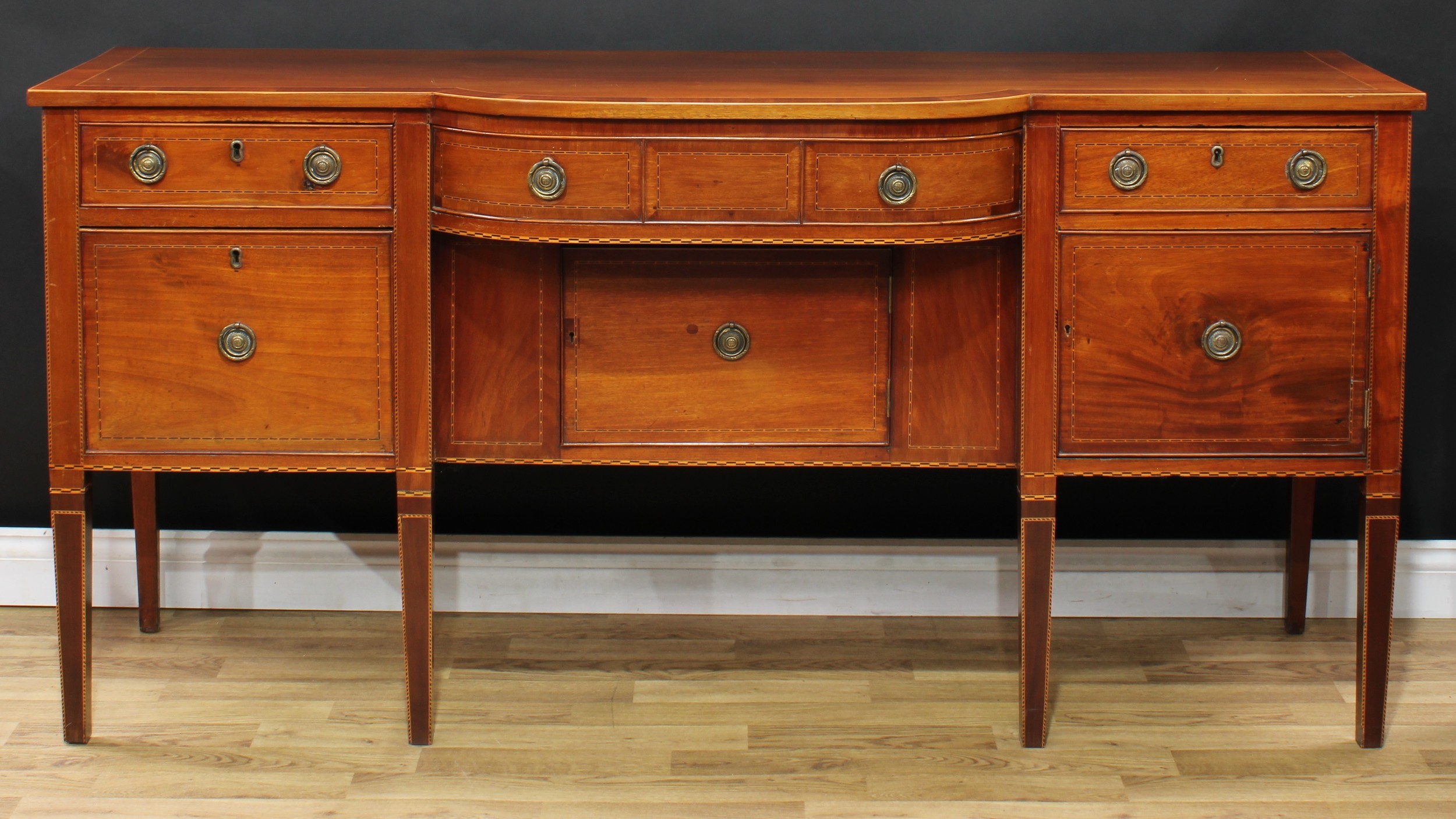 A 19th century mahogany bow-centre sideboard, crossbanded oversailing top above an arrangement of - Image 2 of 5