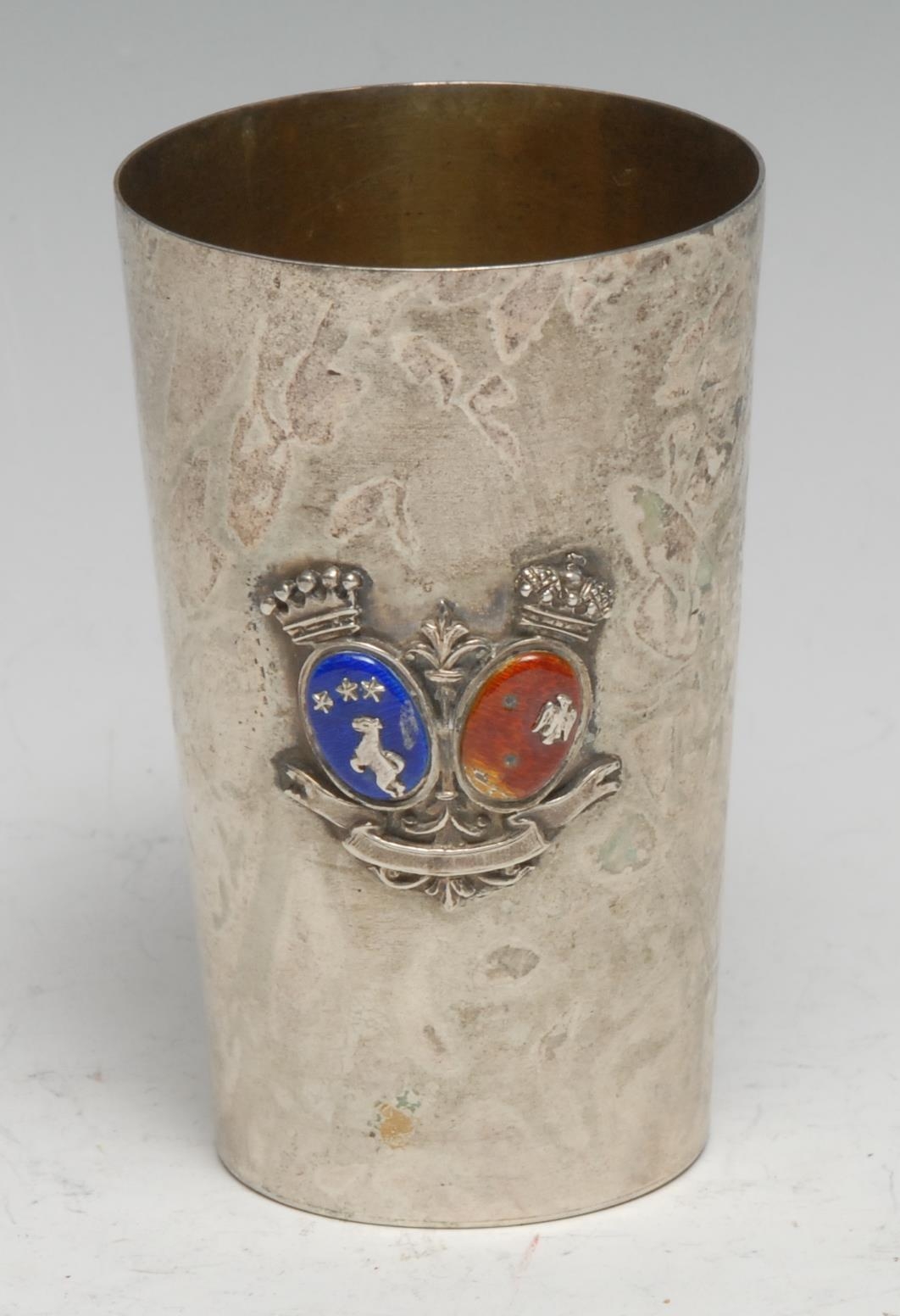 A Continental silver and enamel tapered cylindrical marriage cup, applied with coats of arms, gilt