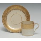 A Pinxton coffee can and saucer, pattern 1, gilt seaweed version, ear-shaped handle, c.1796-1799