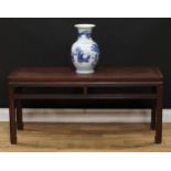 A Chinese hardwood low altar table, rectangular panel top, plain open frieze, square legs, scroll