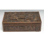 A Chinese hardwood armorial cigar box, hinged cover carved with ferocious dragons and a coat of