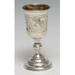 A Russian silver pedestal cup, bright-cut and wrigglework engraved, knopped stem, stepped circular