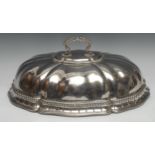 Royal Household Silver - a George III silver fluted domed meat dish cover, engraved with the arms