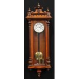 A 19th century walnut Vienna regulator wall clock, 16cm enamel dial inscribed with Roman numerals,