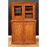 A Post-Regency gonçalo alves library cabinet, by Gillow of Lancaster, stamped, of small and neat