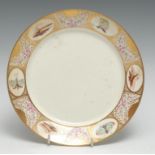 A Pinxton circular plate, the rim painted with alternating ovals of sepia landscapes and