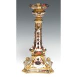 A Royal Crown Derby 1128 pattern Castleton candlestick, dolphin to angles, incurved square base,