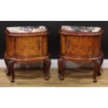 A pair of French Louis XV Revival walnut bedroom cabinets, each with marble top above a serpentine