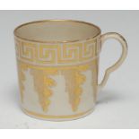 A Pinxton coffee can, ear shaped handle, pattern no.335, decorated in gilt with Greek key and