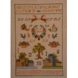 A pair of 20th century Wedding needlework sampler, embroidered in 1934 and 1949, with alphabet,