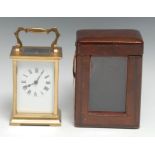 An early 20th century French lacquered brass carriage timepiece, 6cm rectangular enamel dial