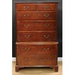 A George III oak chest on chest, rectangular top with moulded edge and dentil capital above two