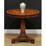 A William IV walnut, rosewood and marquetry centre table, circular tilting top inlaid with a bird
