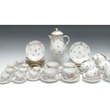 A 20th century Meissen coffee service, comprising coffee pot, six large side plates, nine slightly