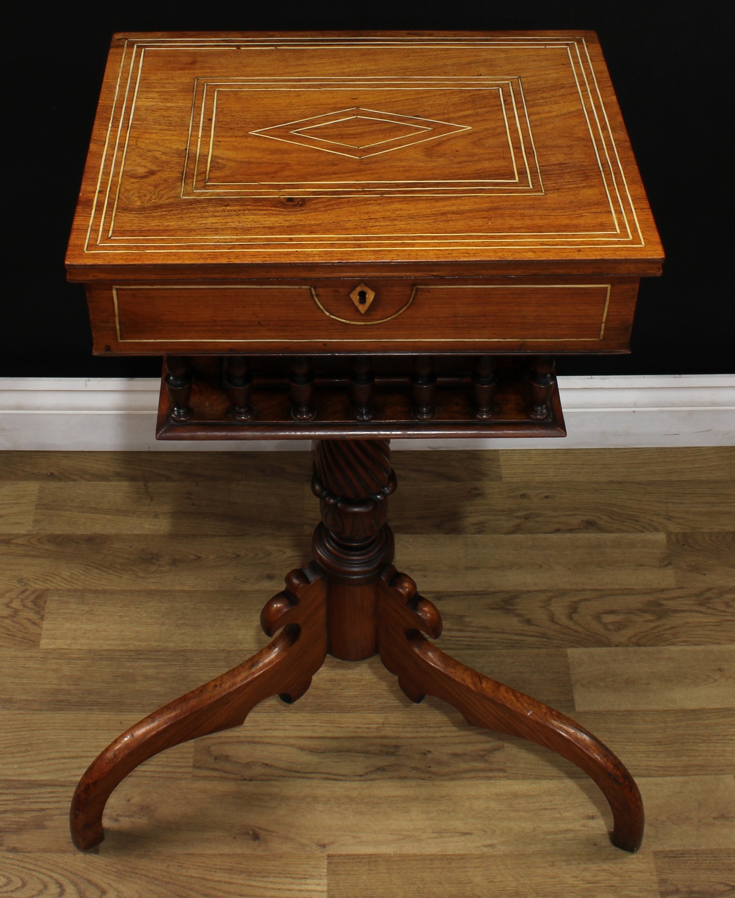 A 19th century Anglo-Indian rosewood tripod work table, hinged top enclosing a fitted interior - Image 3 of 8