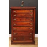 A Victorian walnut Wellington chest, rounded rectangular top above seven graduated drawers,