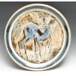 A substantial Studio Pottery circular charger, incised with a faun, on tones of blue, 51cm diam,