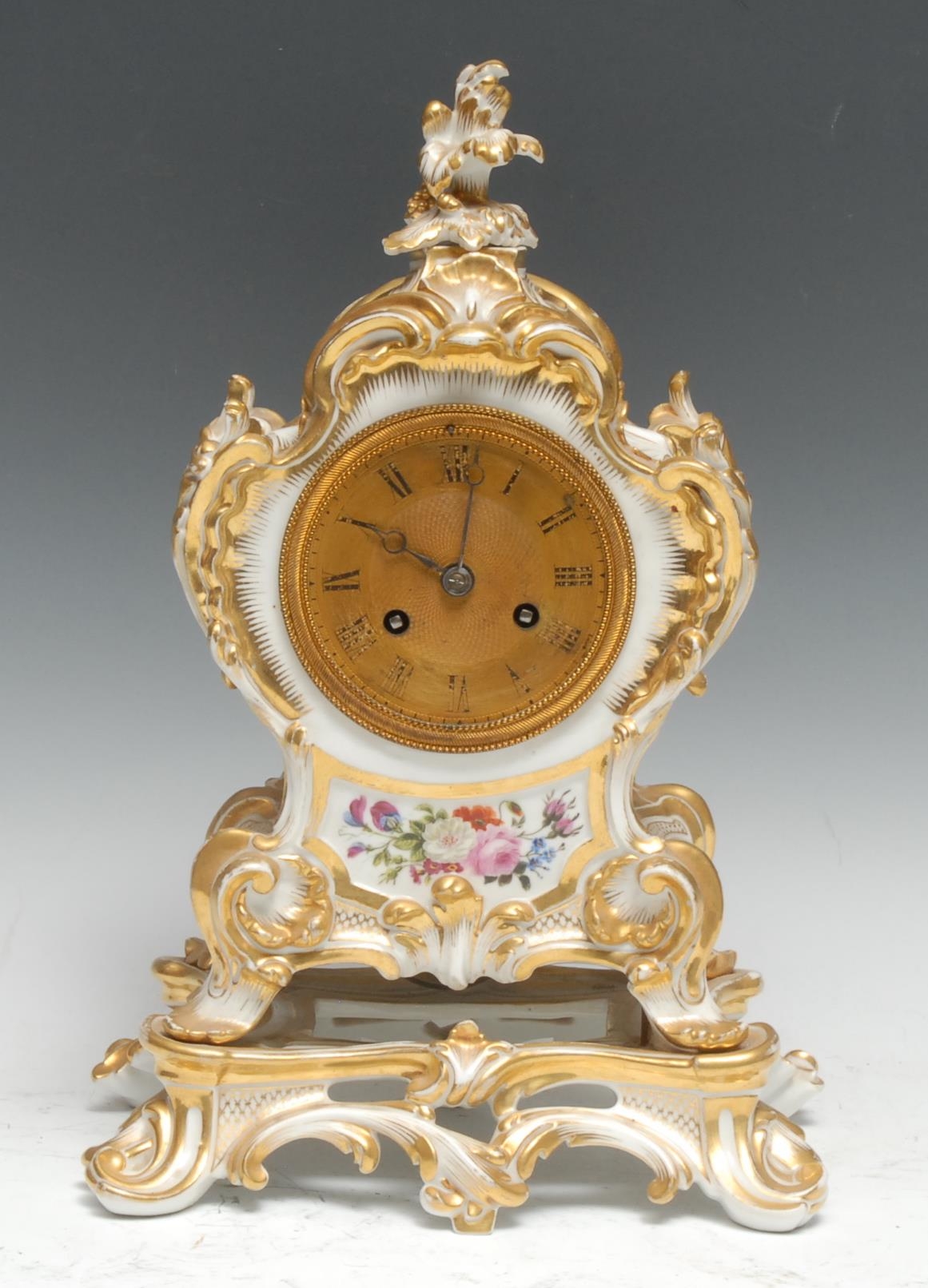 A 19th century Louis XV Revival cartouche-shaped porcelain mantel clock, 7.5cm engine-turned brass