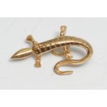 A novelty 20th century gold coloured metal Salamander clip pin, spiralled fitting, unmarked, 29mm