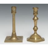 A George I brass candlestick, of seamed construction, dished square base, 18.5cm high, c.1710;