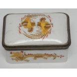 A late 19th Century Meissen rounded rectangular gilt metal mounted porcelain snuff box, the hinged