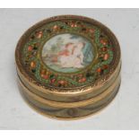 An 18th century French gold mounted vernis martin circular table snuff box, push-fitting cover
