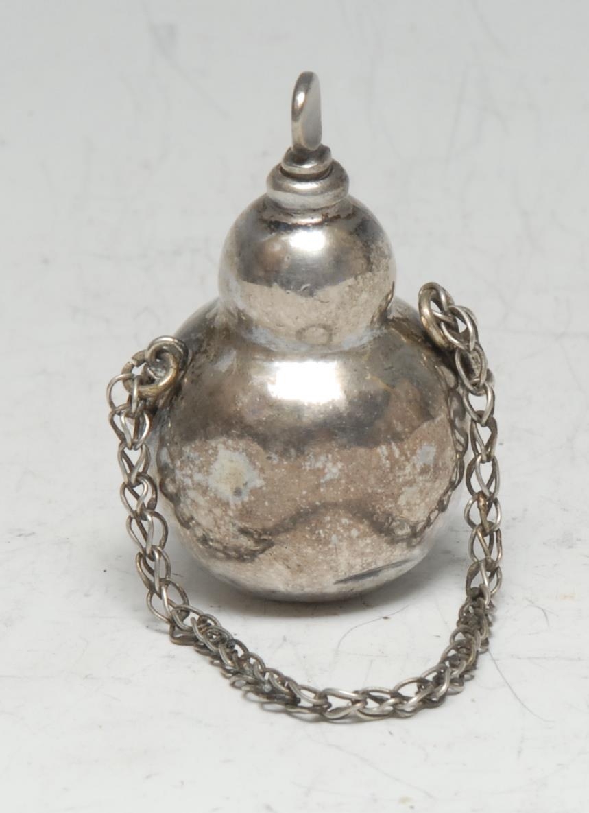 An 18th century Continental silver double-gourd scent bottle or phial, quite plain, twist stopper,