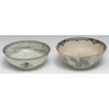 A large Lowestoft bowl, in underglazed blue with butterflies, flower sprays and sprigs, the interior