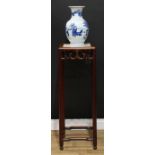 A Chinese hardwood tall vase or jardiniere stand, square top with inset marble panel above a deep