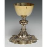 A fine Gothic Revival diamond and sapphire mounted silver-gilt ecclesiastical Communion chalice, the