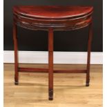 A Chinese hardwood demilune tea table, folding top above a deep frieze carved with scrolls, shaped