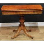 A Regency mahogany tea table, hinged rectangular top above a deep frieze, ring-turned column,