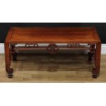 A Chinese hardwood low tea table, rectangular top above a deep frieze pierced and carved with