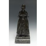 English School (19th Century), a dark patinated bronze, taking a bow, she stands wearing a ribbon
