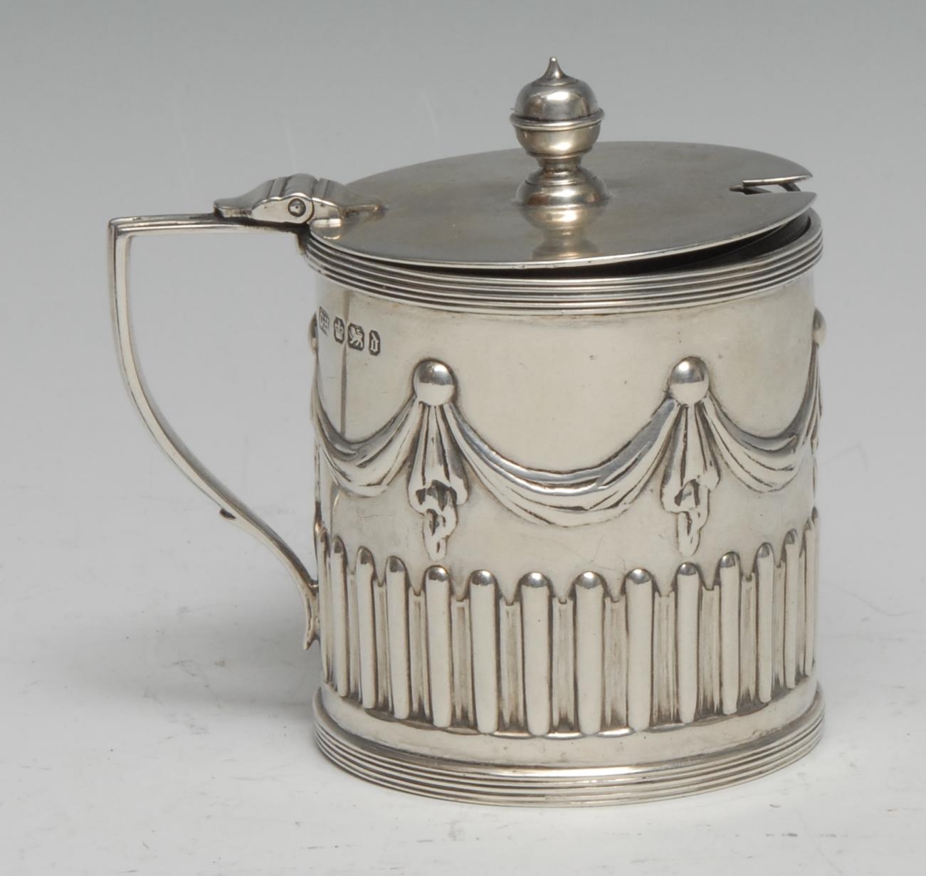 A Victorian Adam Revival silver drum mustard, half-fluted and chased with swags and pendants, hinged - Image 2 of 2