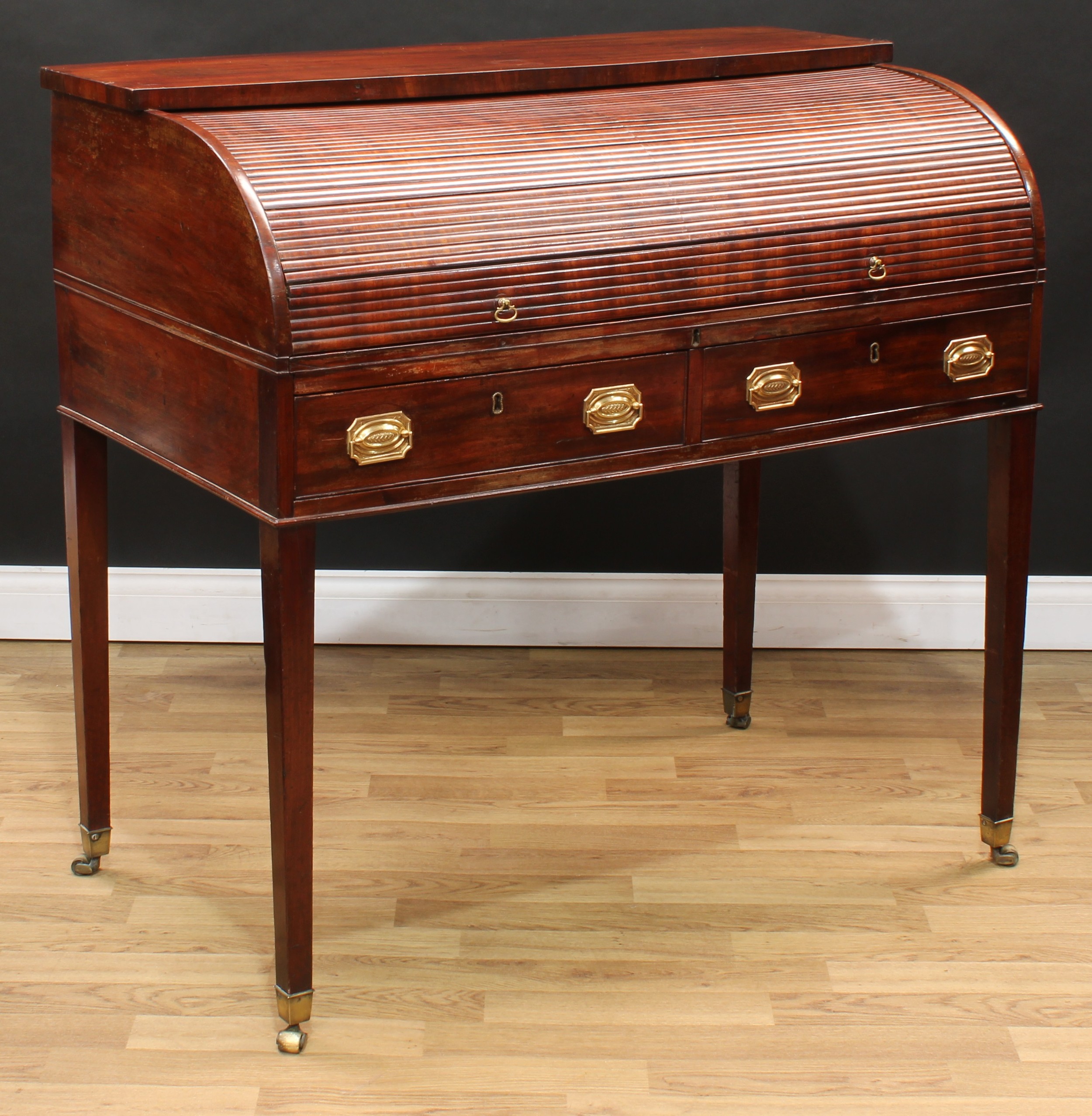 A George III mahogany tambour-fronted writing desk, oversailing top above a retractable front - Image 6 of 9