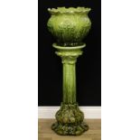 A Victorian Art Pottery jardinière on stand, moulded with scrolling acanthus, 109cm high overall,